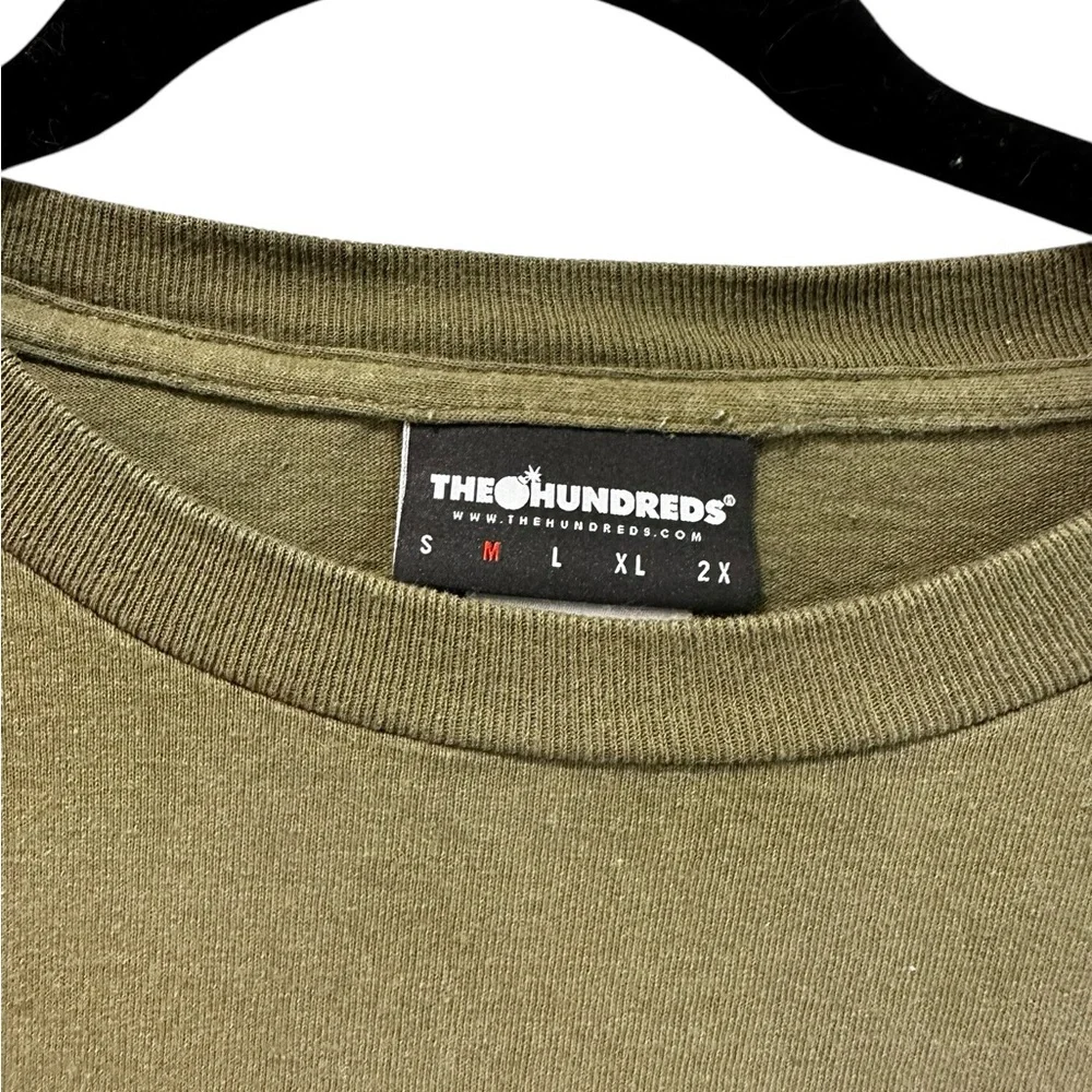 The Hundreds Gotham Post t-shirt Medium Green DC comics Batman Dark Knight Joker
